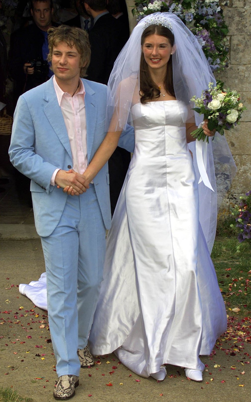 Jamie Oliver and Juliette Norton leaving their wedding.