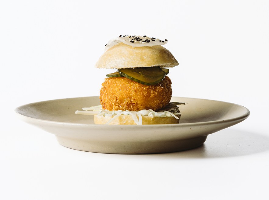 Appetizing mini crab cake slider.