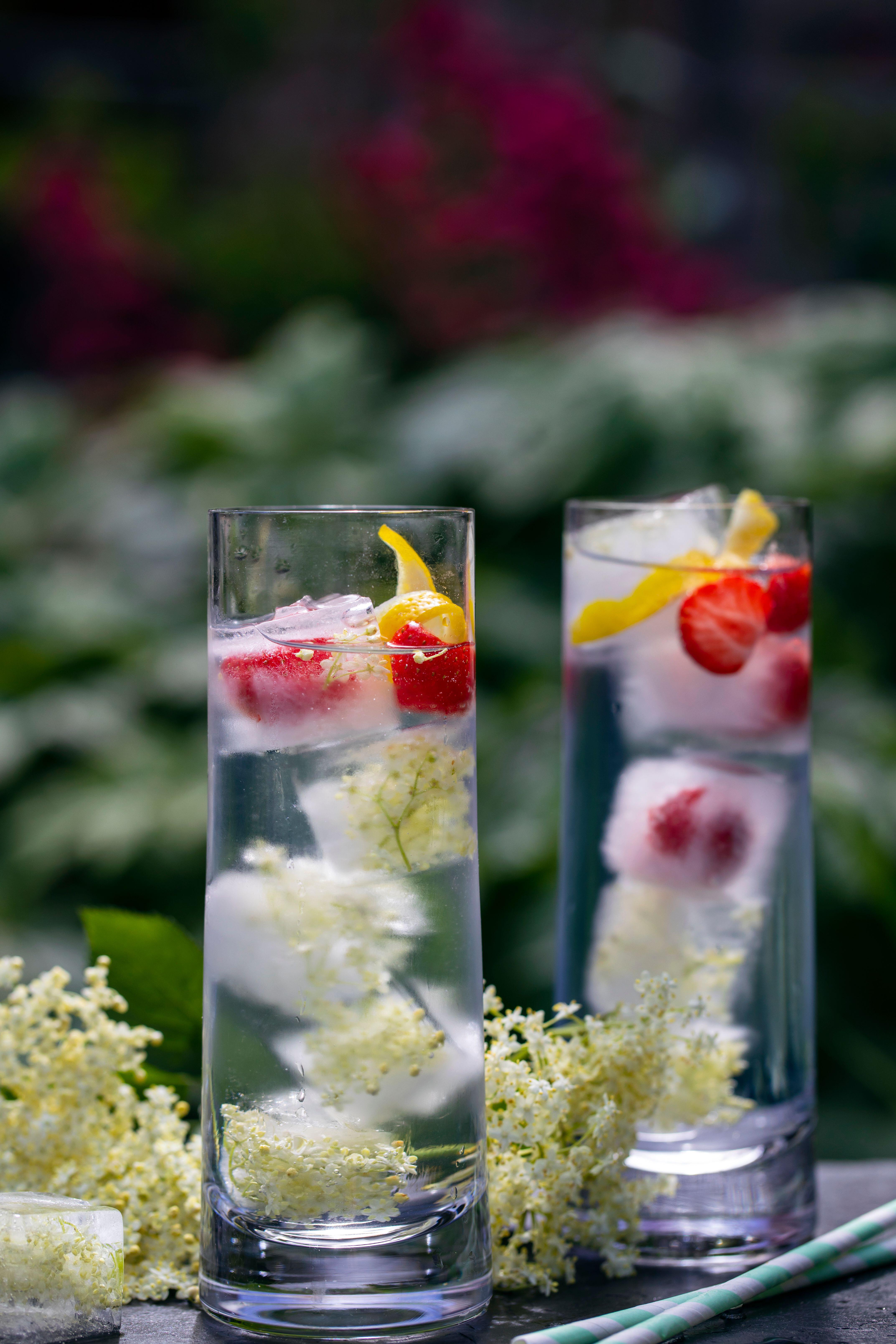 Gin and tonic with elderflower ice cubes.