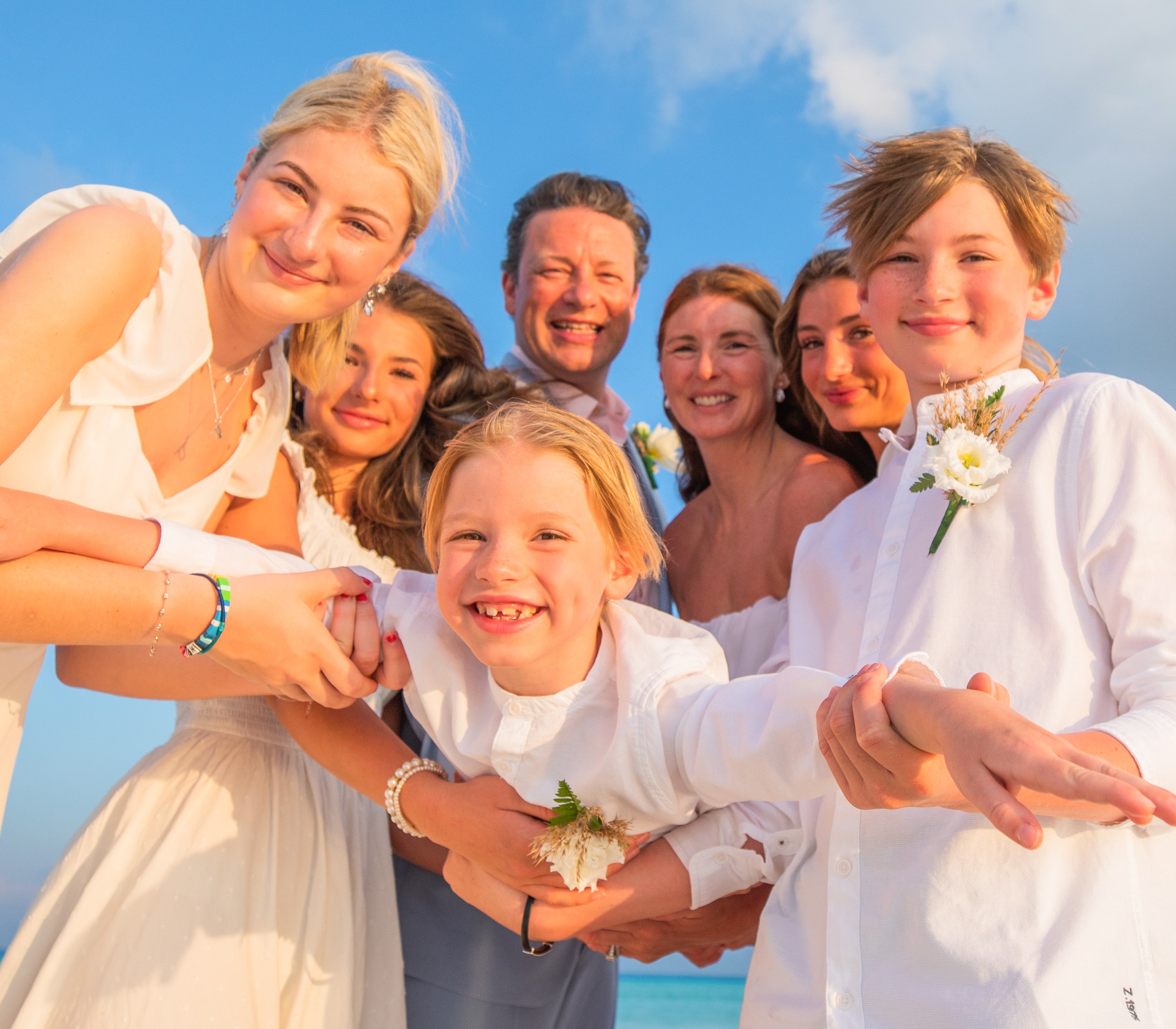 Family portrait on a beach.