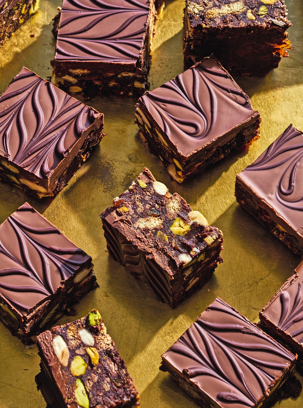Rocky road squares topped with chocolate.
