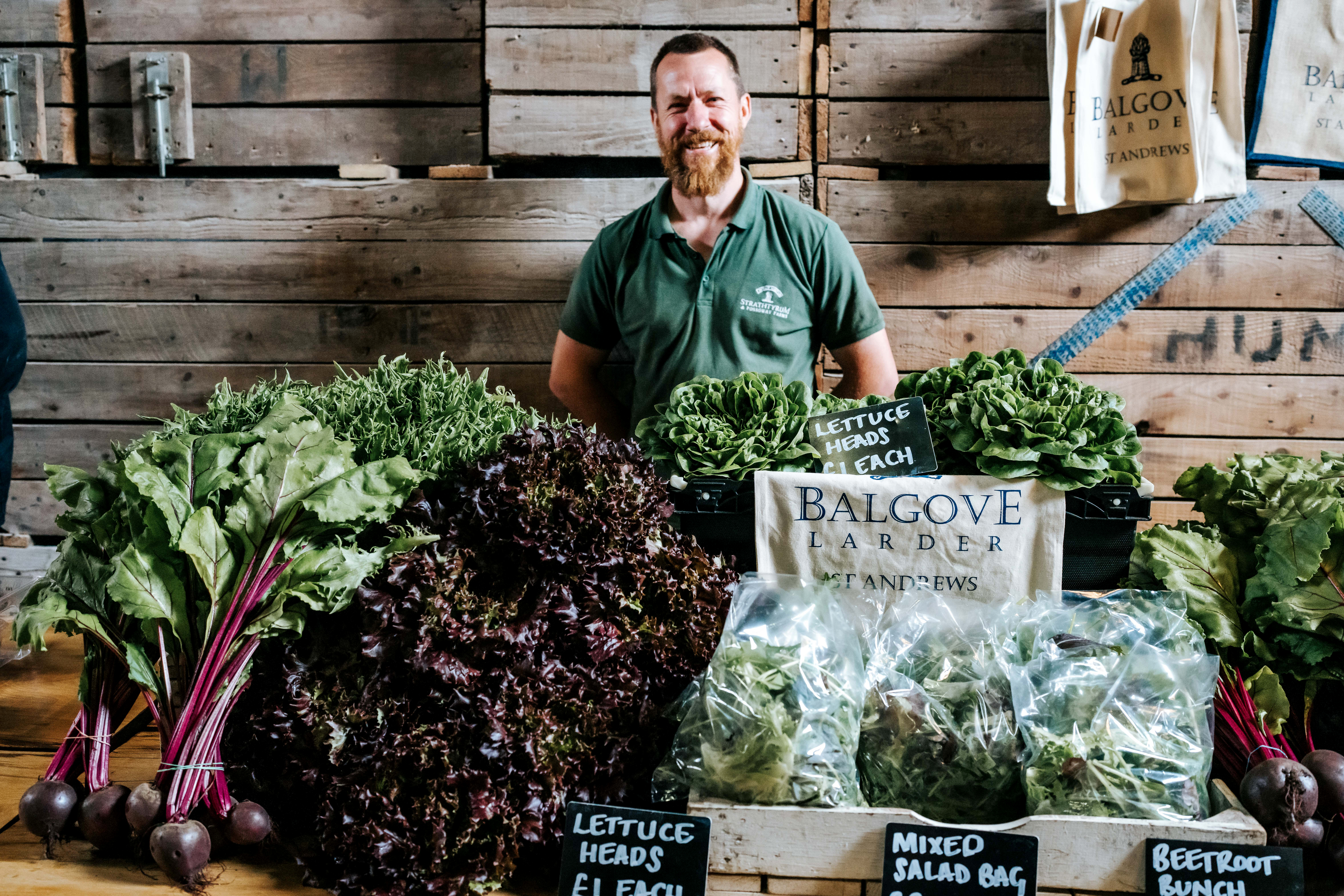 Balgove Larder market stall with fresh produce.